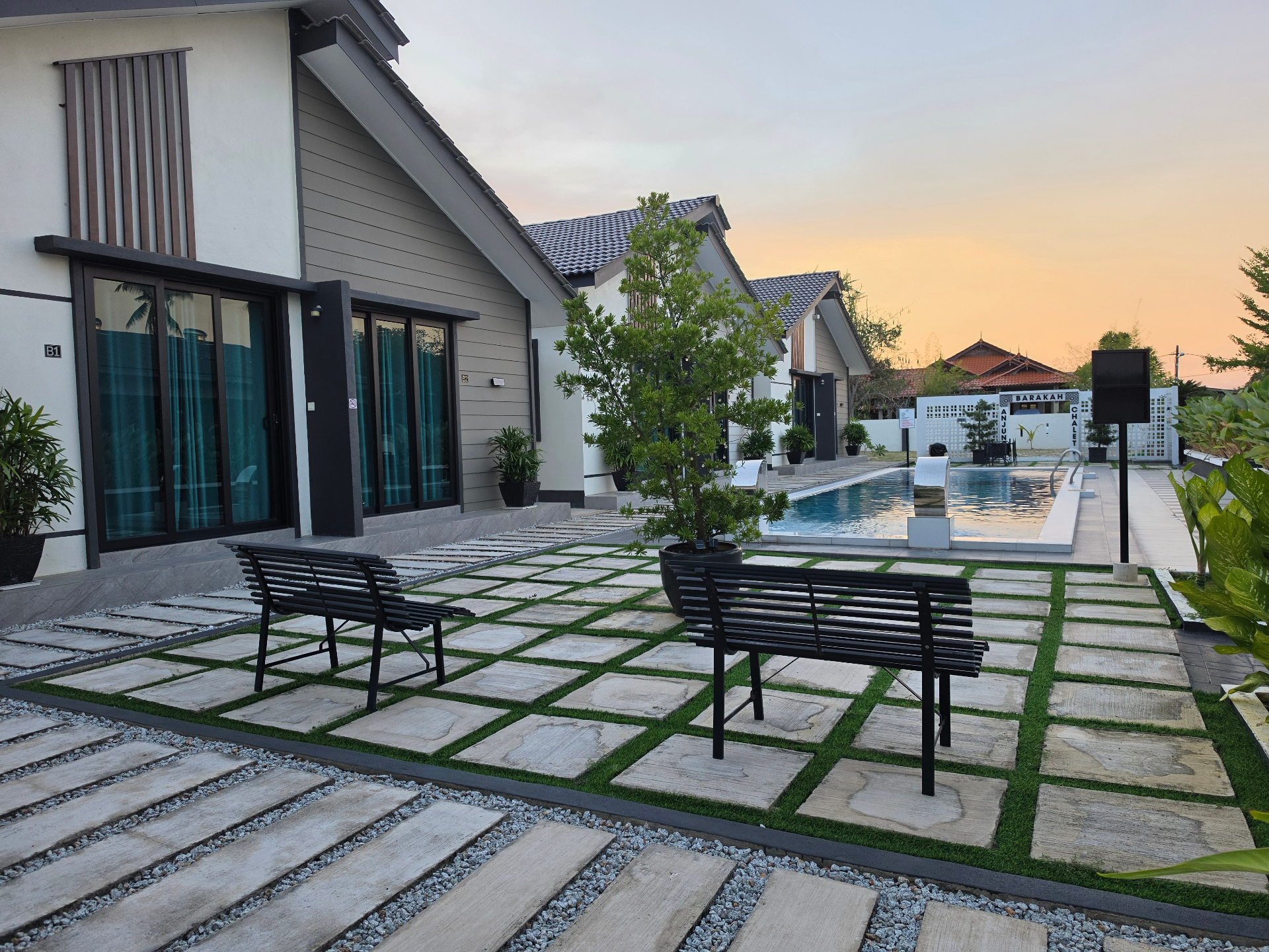 Poolside benches and chalets